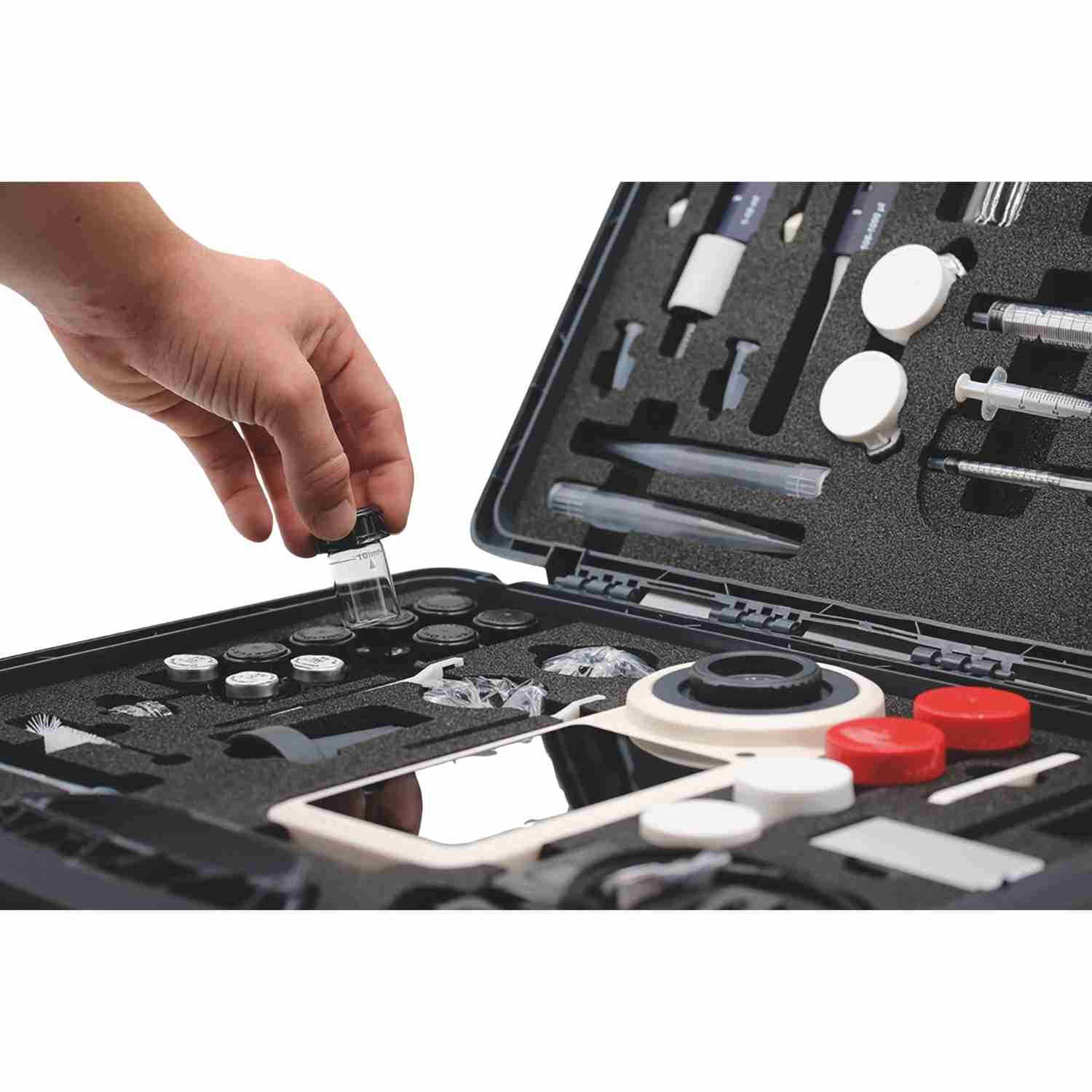 Placing a sample vial into the PrimeLAB photometer kit case