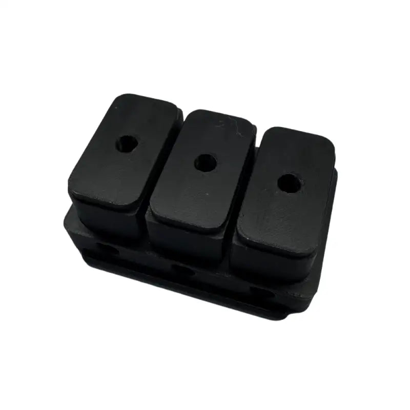Black rectangular rubber bumper with three pads.