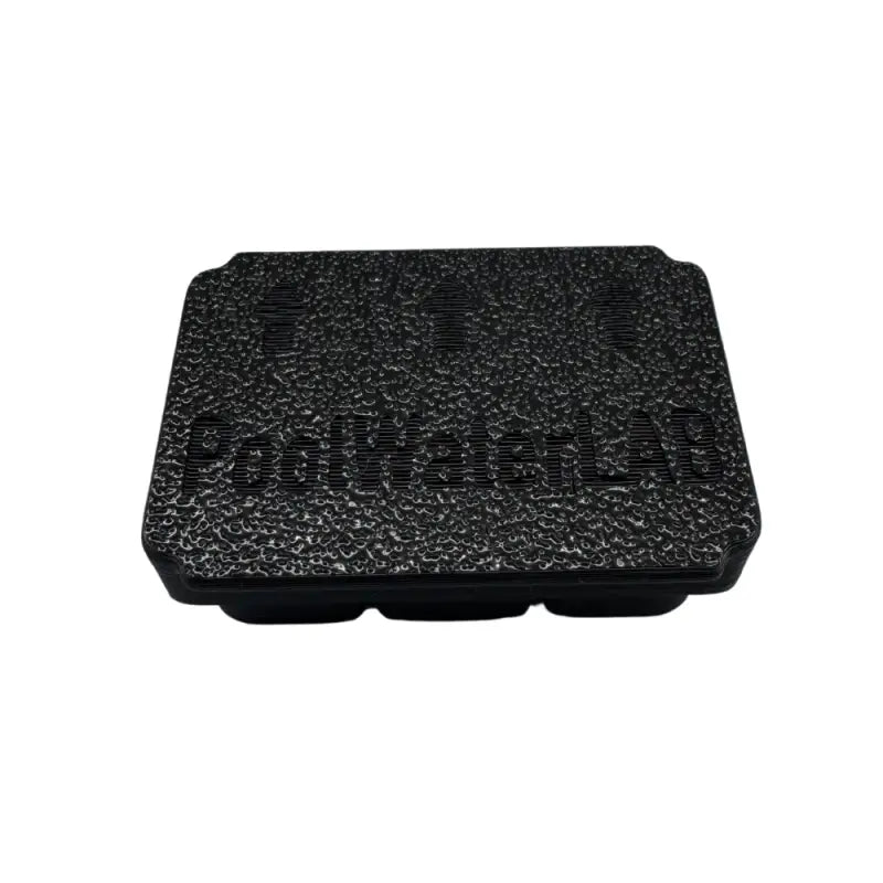 Textured black rectangular box.